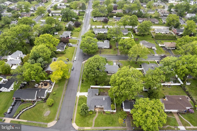 aerial overview of property's location with nearby suburban area
