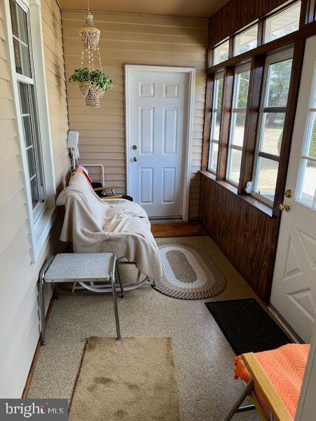 sunroom with plenty of natural light