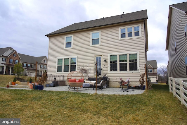 back of house with a patio area, an outdoor hangout area, a yard, and fence