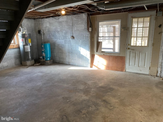 basement featuring electric water heater