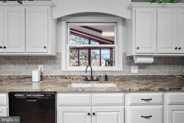 kitchen with dishwasher, a sink, white cabinetry, and decorative backsplash