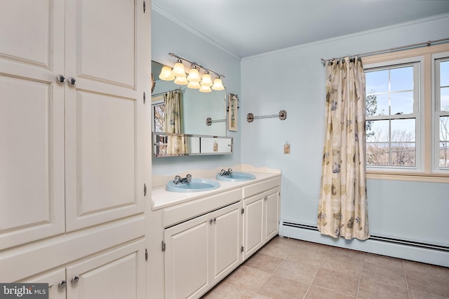 full bath with crown molding, double vanity, a baseboard radiator, a sink, and tile patterned floors