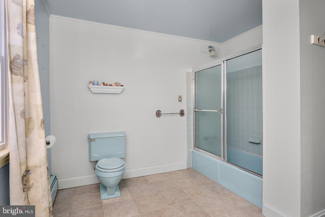 bathroom featuring toilet, tile patterned flooring, enclosed tub / shower combo, and baseboard heating