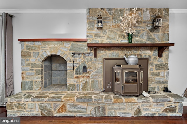 room details featuring ornamental molding and a wood stove