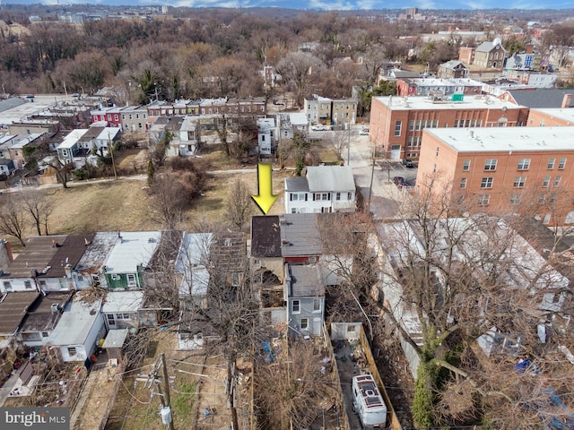 birds eye view of property with a residential view