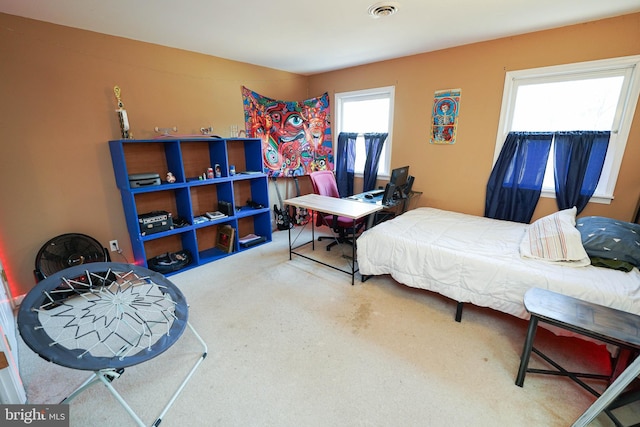 bedroom with visible vents