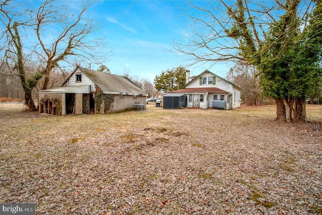 6037 Drum Point Rd, Deale, MD 20751 - exterior space with a barn and an outbuilding