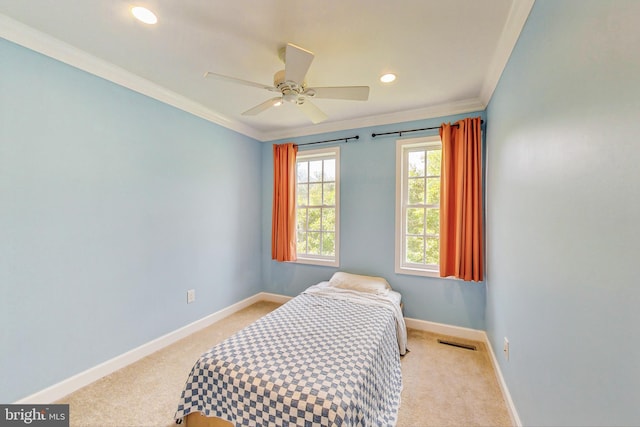 bedroom featuring recessed lighting, carpet flooring, visible vents, baseboards, and crown molding