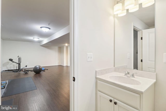 bathroom featuring vanity and wood finished floors