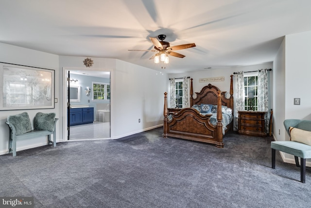 bedroom featuring carpet, baseboards, ceiling fan, and connected bathroom