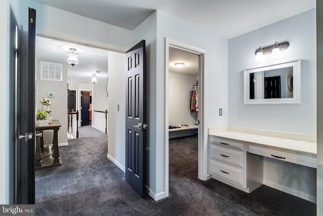 bathroom featuring visible vents and baseboards