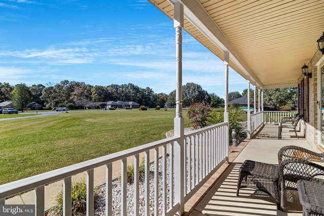 balcony featuring covered porch