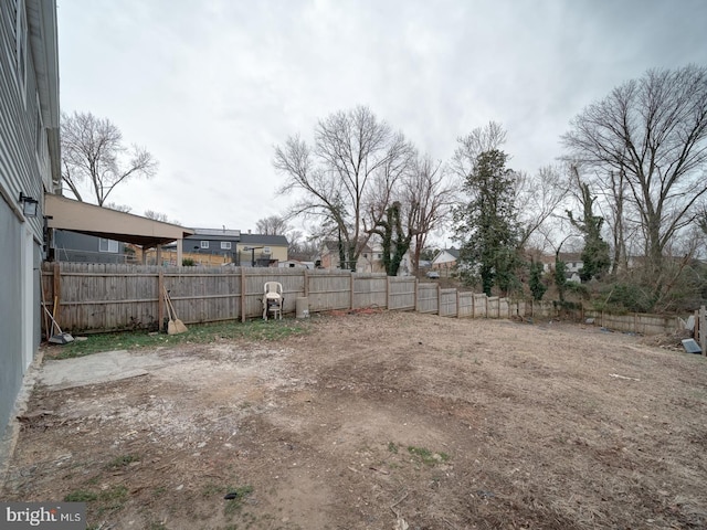 view of yard with a fenced backyard