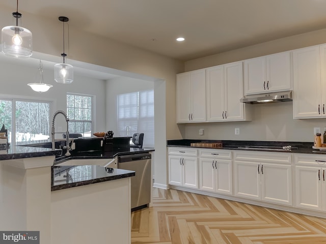 kitchen with under cabinet range hood, decorative light fixtures, white cabinetry, black electric cooktop, and stainless steel dishwasher