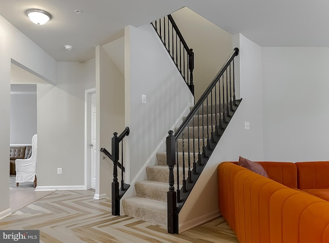 stairway with baseboards