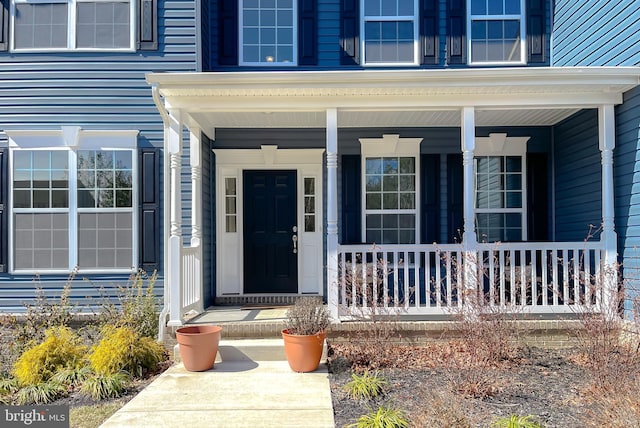 entrance to property with covered porch