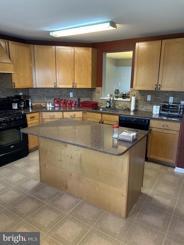 kitchen with tasteful backsplash, a sink, a kitchen island, premium range hood, and black appliances