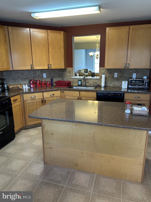 kitchen featuring black dishwasher, decorative backsplash, a center island, gas range oven, and a sink