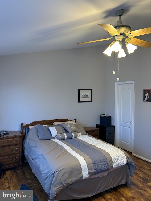 bedroom featuring ceiling fan and wood finished floors