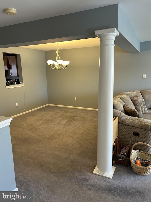 interior space with carpet floors, an inviting chandelier, and baseboards