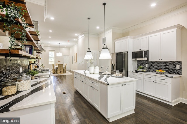 kitchen featuring appliances with stainless steel finishes, dark wood-style flooring, crown molding, and open shelves