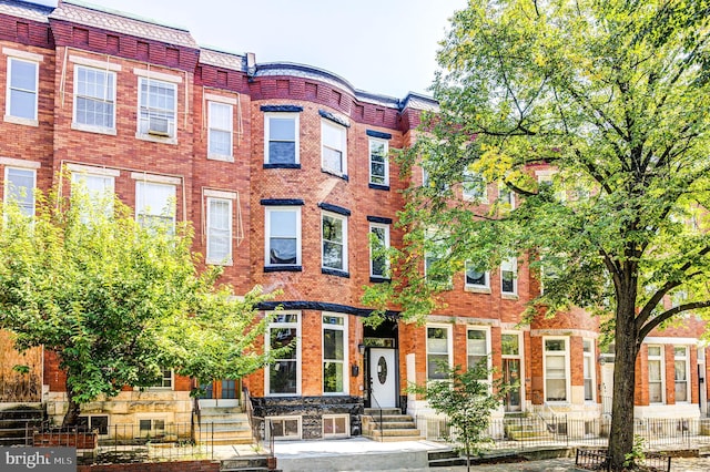 multi unit property featuring brick siding