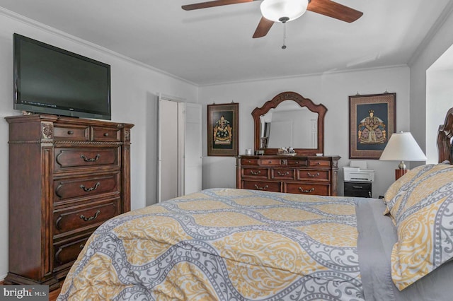 bedroom featuring ornamental molding and ceiling fan