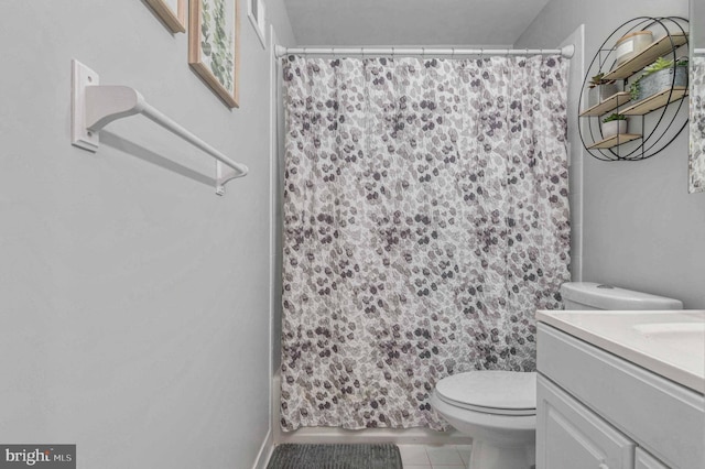 full bathroom with toilet, tile patterned floors, shower / bath combination with curtain, and vanity