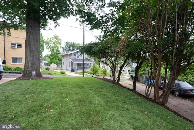 view of yard featuring a residential view