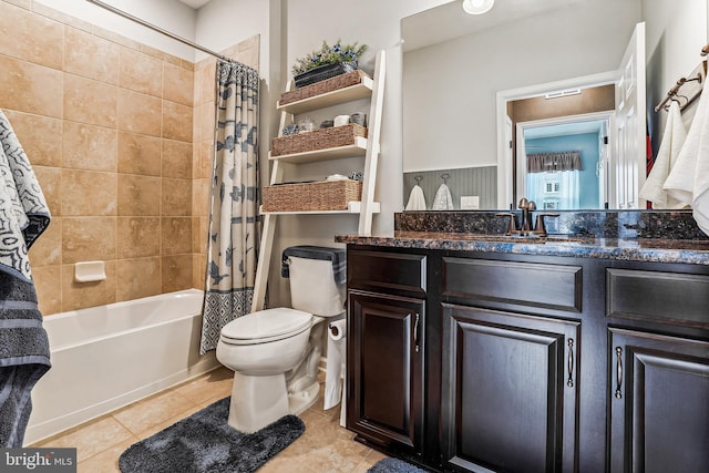 full bath featuring tile patterned flooring, toilet, vanity, and shower / bathtub combination with curtain