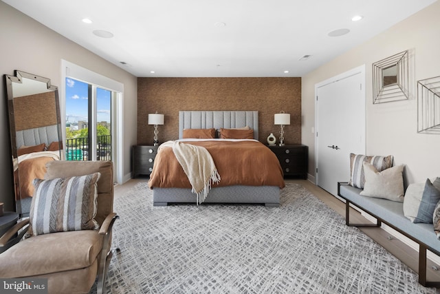 bedroom with visible vents, recessed lighting, baseboards, and access to outside