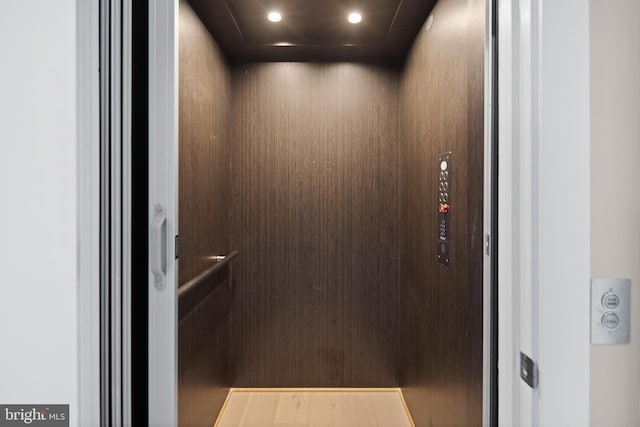 details featuring recessed lighting and elevator