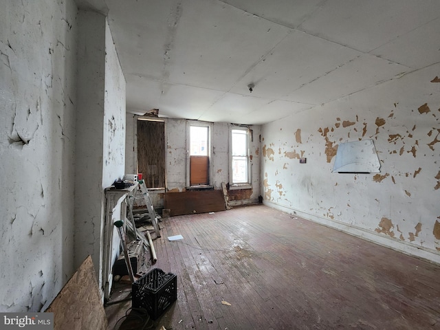 spare room featuring hardwood / wood-style floors