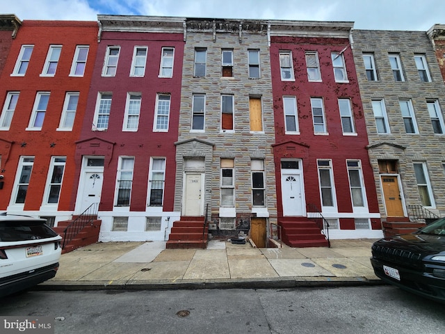 view of building exterior with entry steps