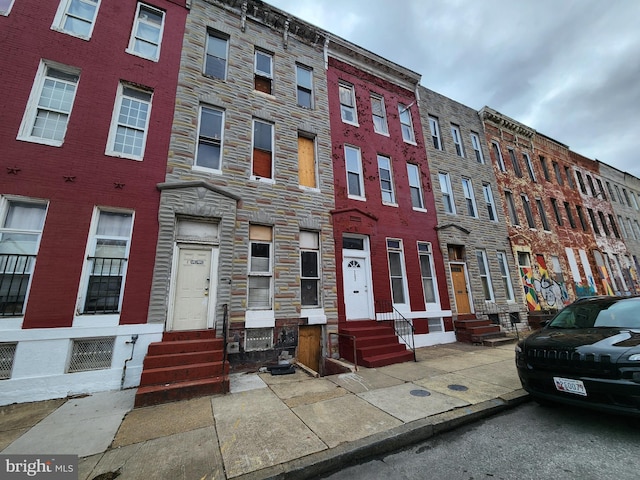 view of building exterior with entry steps