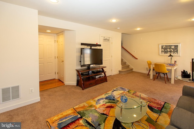 living room featuring visible vents, recessed lighting, stairway, carpet floors, and baseboards