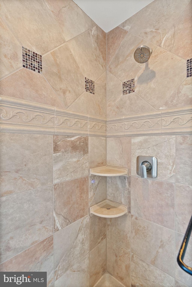 details with a tile shower