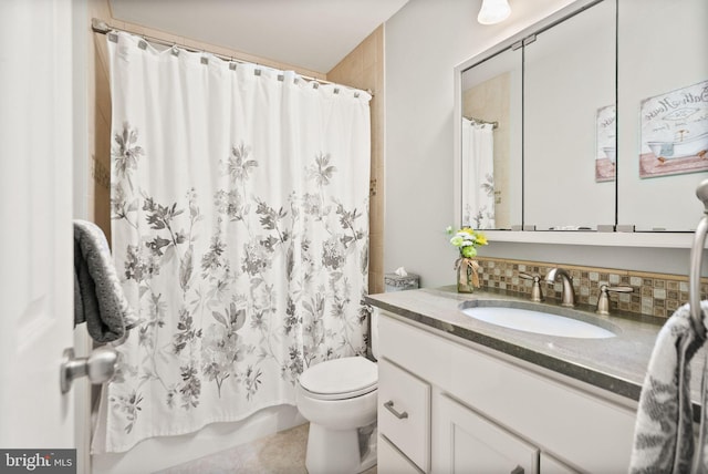 full bathroom with shower / bath combo, toilet, vanity, and decorative backsplash