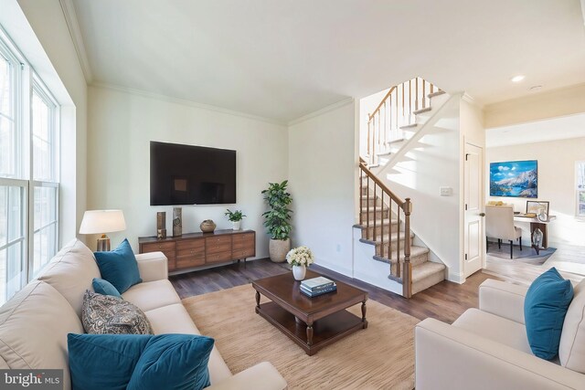 305 Poplar Ave, Newark, DE 19711 - living area featuring stairway, wood finished floors, and ornamental molding