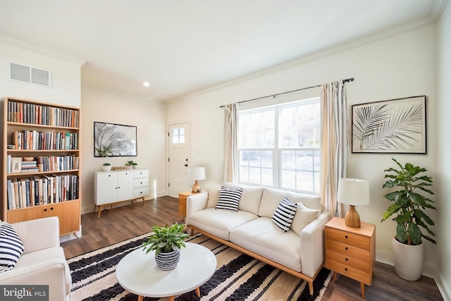 305 Poplar Ave, Newark, DE 19711 - living room featuring visible vents, wood finished floors, and ornamental molding