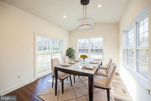 305 Poplar Ave, Newark, DE 19711 - dining room with vaulted ceiling, wood finished floors, visible vents, and a healthy amount of sunlight