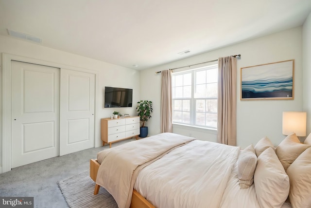 305 Poplar Ave, Newark, DE 19711 - bedroom with carpet floors, a closet, and visible vents