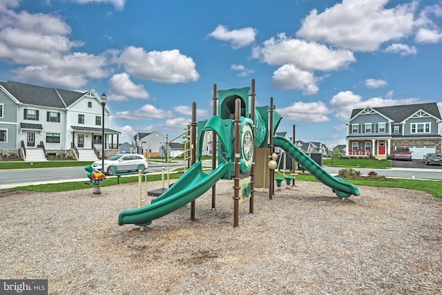 community jungle gym featuring a residential view