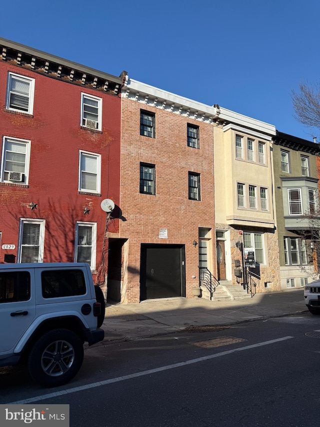 view of building exterior featuring an attached garage