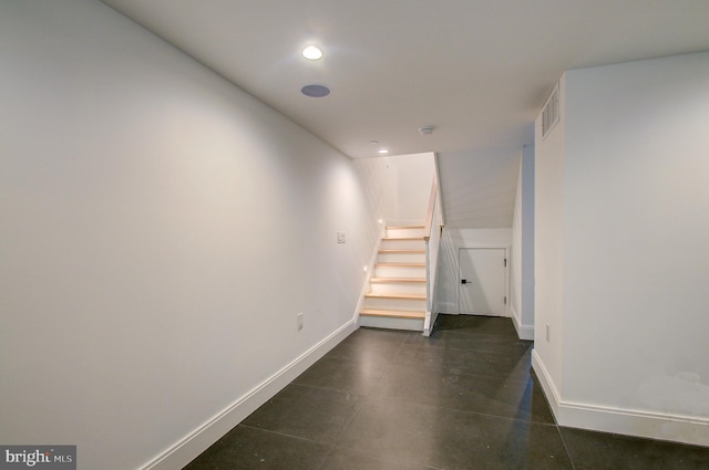 interior space with stairway, recessed lighting, visible vents, and baseboards