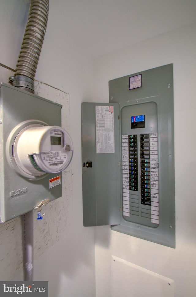 utility room featuring electric panel