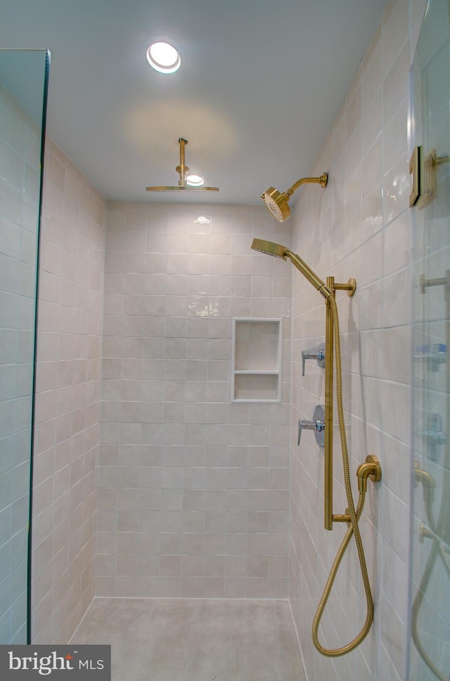 bathroom featuring a stall shower, a ceiling fan, and recessed lighting