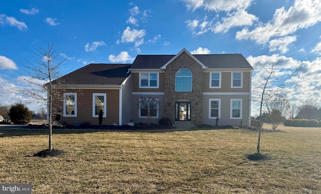 view of front facade featuring a front yard