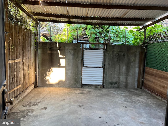 exterior space featuring a carport