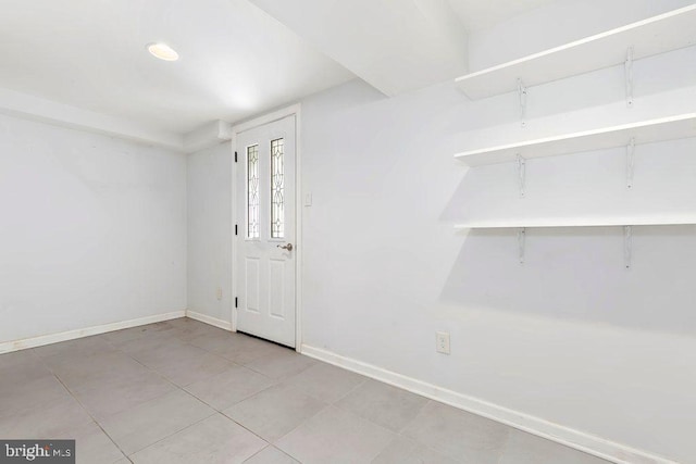 foyer entrance with baseboards